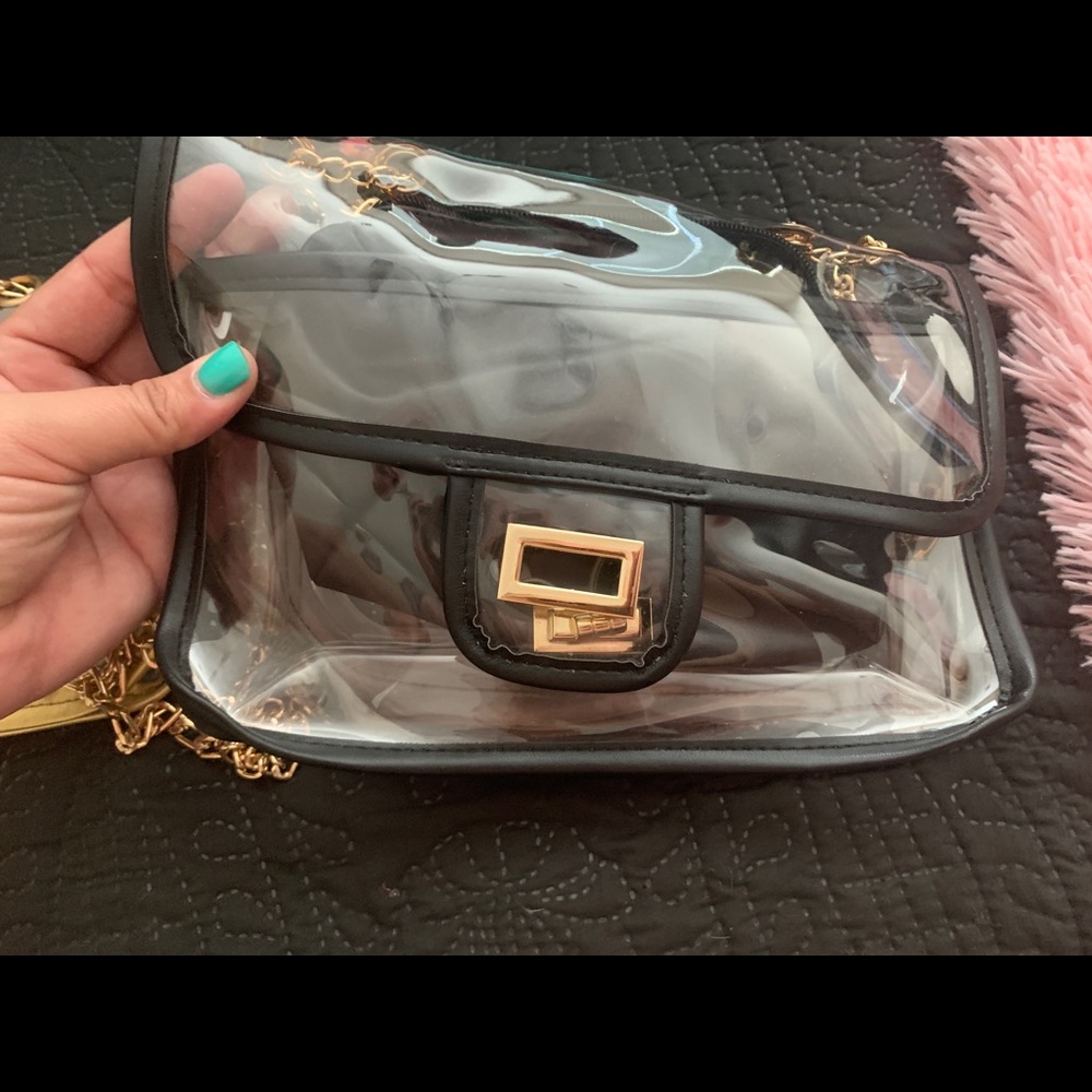 Black clear purse never used